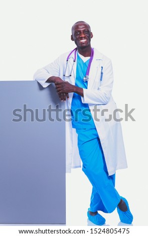 Male doctor holding empty placard. Doctor. Billboard