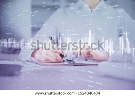 Financial chart drawn over hands taking notes background. Concept of research. Multi exposure