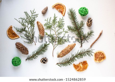 fir cones, branches, dried orange. New Year's decor details. Christmas