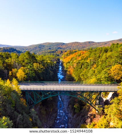 Aerial view of Quechee Gorge bridge in Vermont during fall season Royalty-Free Stock Photo #1524944108