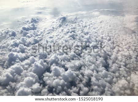 Sky clouds taking pictures from an airplane.