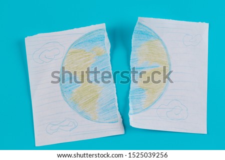 Drawing of the earth planet. Torn into pieces.