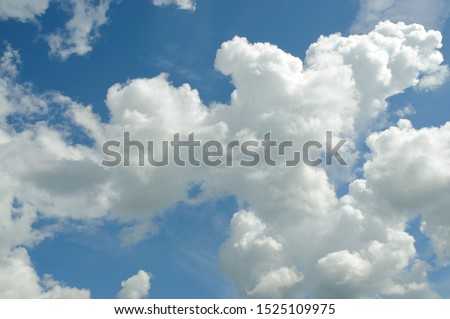 Blue sky with scenic white clouds backdrop