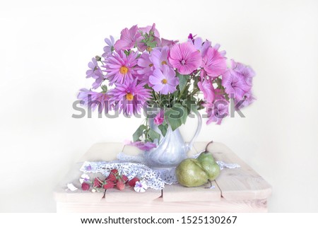 Bouquet of pink flowers in vase isolated on white background