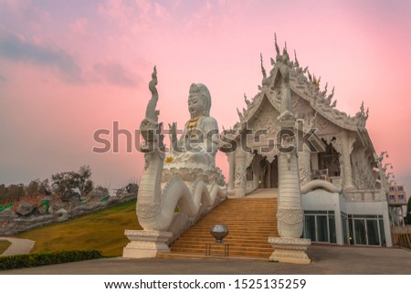 beautiful white church infront of the biggest Guan Yin statue in Chinese temple wat Hyua Pla Kang at Chiang Rai north of Thailand.
