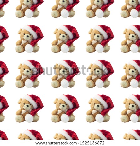 Christmas rat in a red Santa hat and ribbon bow seamless pattern. Symbol of the year 2020 on a white background isolated. Greeting card. Soft toy, cute New Year animals, copy space, front view.
