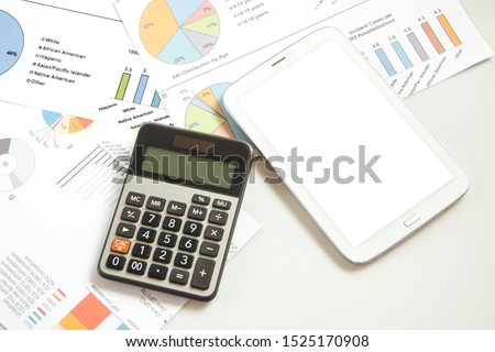 Planning business and finance by lood for flow chart and use calculator and taplet for calculate, Business and finace concept image.