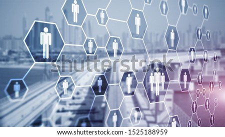 3d Digital composite image of people icons on office buildings background.
