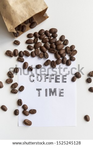 Roasted coffee beans in paper bag