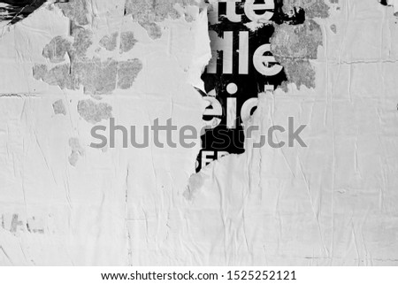 Black white torn grungy arty street poster with exposed typography text