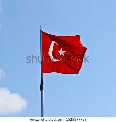 A Turkish flag blowing in the wind. 