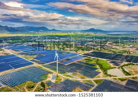 Aerial view of Solar panel, photovoltaic, alternative electricity source - concept of sustainable resources on a sunny day, Phuoc Dinh, Ninh Phuoc, Ninh Thuan, Vietnam