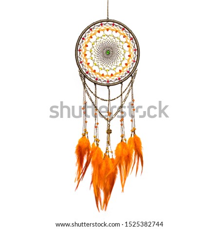 Dream catcher with feathers threads and beads rope hanging. Dreamcatcher handmade isolated on white Royalty-Free Stock Photo #1525382744