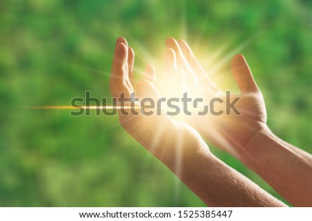 Woman hands praying for blessing from god, blurred nature background, rain, day. Religious human open empty hands with palms up. Gratitude, preacher worship, solitude pray, religion devotion concept Royalty-Free Stock Photo #1525385447
