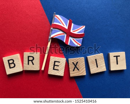 Brexit and Union Jack Flag on blue and red background