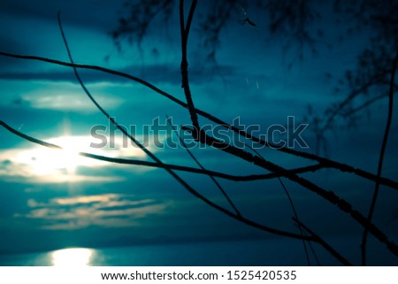 Sunset , Sky and calm sea background in the evening time at sea 