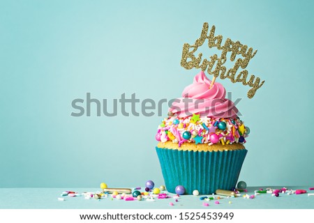Celebration cupcake with happy birthday message