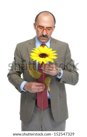 The businessman and flower on a white background