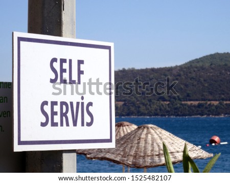 A self service sign in Turkey.                             