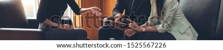 Business negotiation at the meeting. Businessman and Business woman discussing, talking, consulting and brainstorming with partner and client at the office. Royalty-Free Stock Photo #1525567226