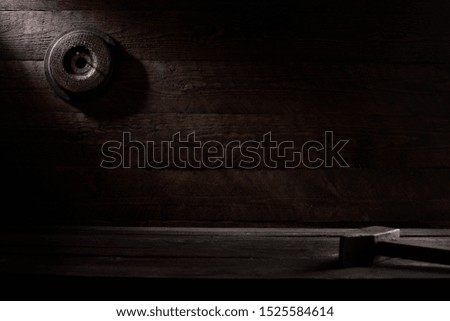 Different workpieces on a wooden background. Hedge wrenches keys, hammer