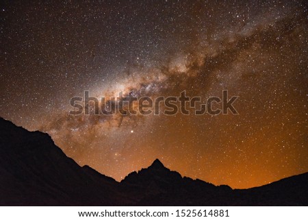 Milky Way and starry skies over Mt Ausungate and the Andes mountains. Cusco, Peru