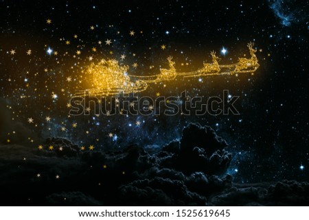 Golden snowy flying Santa Claus on the background of the night sky.