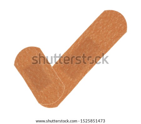 A tick check checkmark medical plasters isolated on white with clipping path