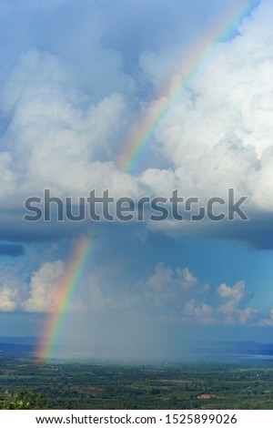 In the beautiful sky with rainbows and rain make it happiness weather