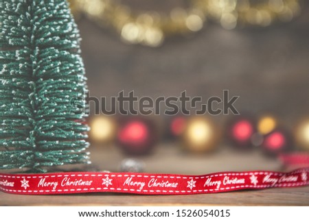 Christmas background with tree and blurred balls