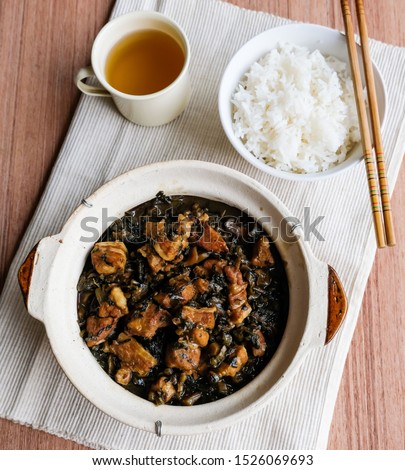 Delicious homemade meal / Stew Mui Choy aka Preserved Vegetable with Pork Belly / A popular dish made famous by the Hakka people, the pork belly's fat melts in your mouth, eaten with rice or porridge