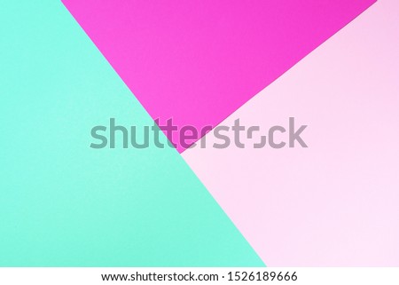 Background in trendy green and pink colors. Fashionable paper. Top view. Minimal concept. Trendy mint color.