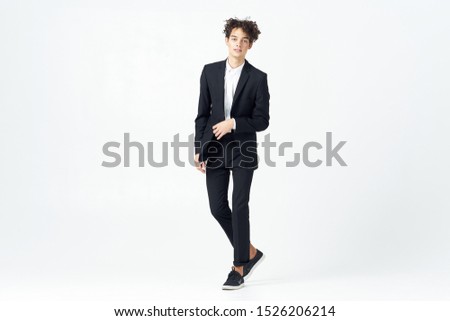 Handsome man curly hair studio business professional