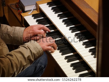 The Organ Concert in the Church, Germany. Musical Performance Background. Musician Hands.