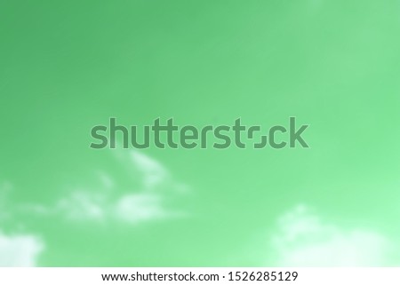 Bright evening sky in Thailand, bright background with green blurred blur