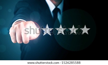 Businessman without head pointing five star visual symbol to increase rating of company. COPY SPACE.