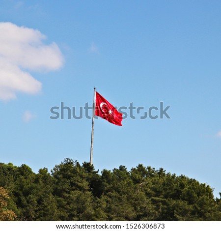 A Turkish flag blowing in the wind. 