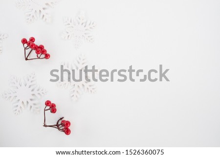 Christmas composition. Christmas frame made of snowflakes on white background. Winter concept. Flat lay, top view, copy space .