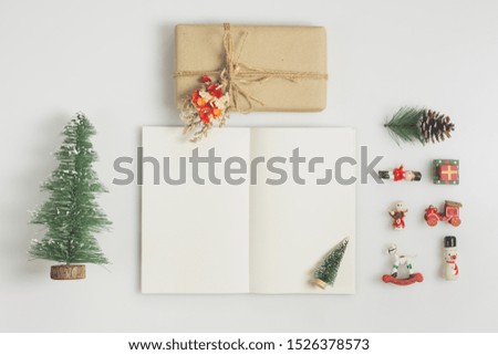 Handmade Gift box and notebook mock up with christmas ornaments on white  background