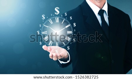 Businessman Without Head Dollar sign clock on hand. Business Concept time is money. COPY SPACE.