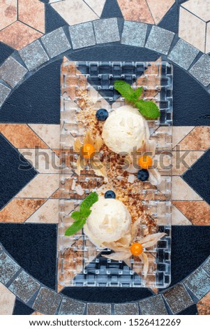 Homemade vanilla ice cream on a stone ornament