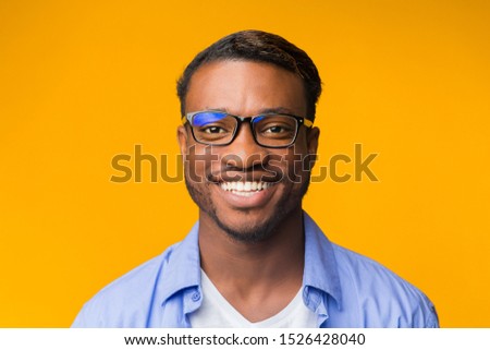 Smile. Positive African American Man Looking At Camera Posing Over Yellow Background. Studio Shot