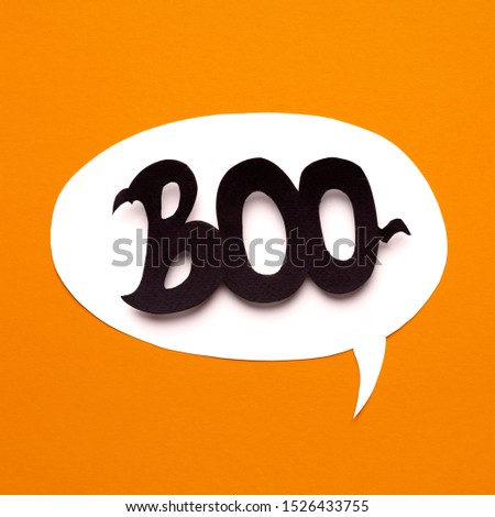 Close up of boo big text inside speech bubble for Halloween party advertisement