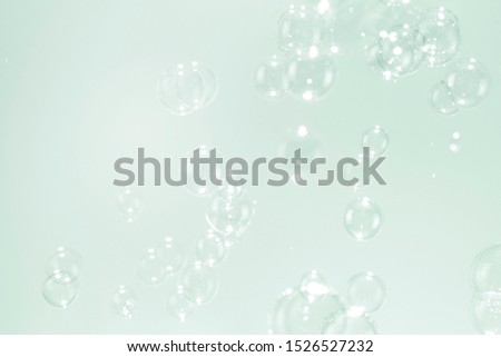 freshness of nature background, bright soap bubbles floating in the air
