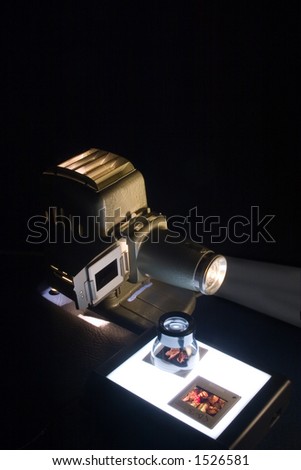 Vintage projector and lightbox with lupe