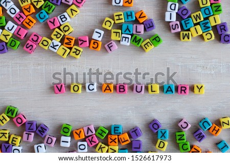 vocabulary, learning language concept from colorful letters Royalty-Free Stock Photo #1526617973