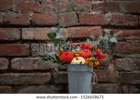 halloween pumpkins with flowers and background 