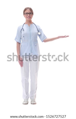 friendly woman doctor looking at copy space. isolated on white