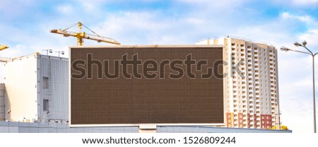 Billboard on the background of the construction site. Place for text. Background.