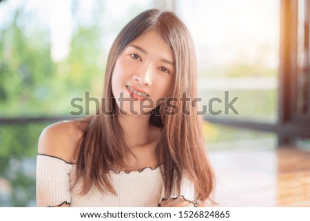Beautiful young woman with sunrise, Asian girl, Portrait of young beautiful asian woman facial treatment relax.